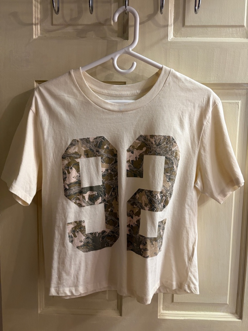 Rebellious One Cream Graphic Tee with Camo '93' Print